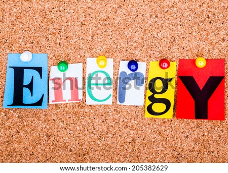 The word Energy  in cut out magazine letters pinned to a cork notice board
