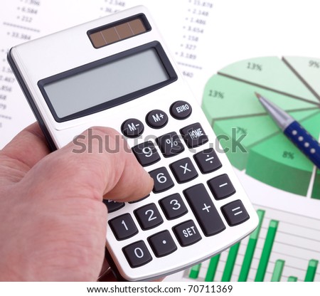 Business! - Calculating in front of charts