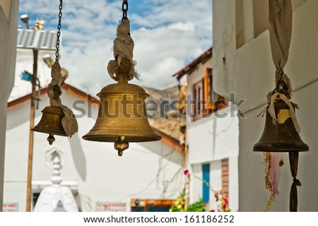 Bronze bells in front of Buddhist Temple. India, Himachal Pradesh