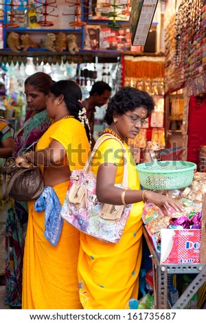 Trichy, India - Febr 14: Indian Women Buying Colorful Bangles At Market Place On Febr 14, 2013. Lot Of Bangles Is Traditional Female Fashion Attributes In India. India, Tamil Nadu, Thanjavur (Trichy)