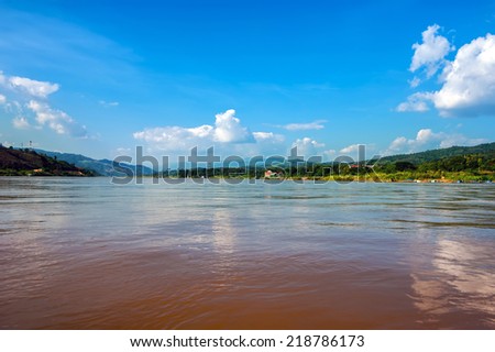 Panoramic view of Mekong river flowing between Laos on right side and Thailand at left side. Travel landscape and destinations