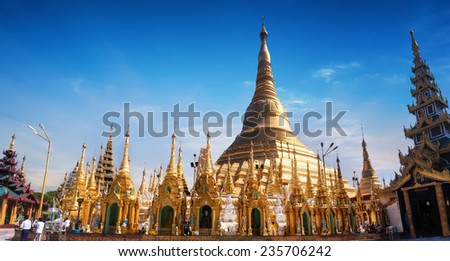 Amazing architecture of Shwedagon or Great Dagon Pagoda. Most sacred Buddhist place with relics of four past Buddhas. Yangon, Myanmar (Burma) travel landscapes and destinations. Ten images panorama