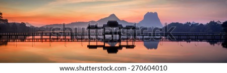 Amazing park landscape panorama at sunrise. Bridge and pavilion on lake at Hpa-An, Myanmar (Burma) travel landscapes and destinations. Five images panorama