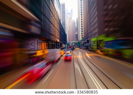 Watercolor painting effect. Moving through modern city street with skyscrapers. Hong Kong. Abstract cityscape traffic background with taxi car driving. Motion blur, art toning