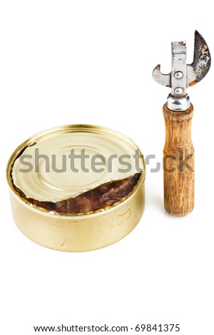 Old dirty tin can opener with wooden handle and opened tin can with food on white background