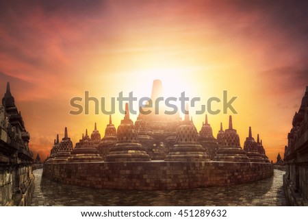 Amazing sunset at Borobudur Temple. World Buddhist heritage and great architecture of 9th century. Java island, Indonesia