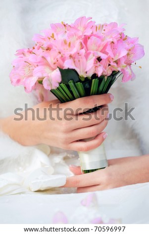 Bridal bouquet / bridal bouquet in the hands of the bride