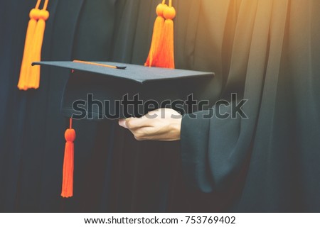 graduation,Student hold hats in hand during commencement success graduates of the university,Concept education congratulation.Graduation Ceremony,Congratulated the graduates in University.