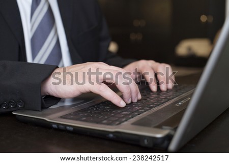 Business Man Typing On Laptop Computer Close up