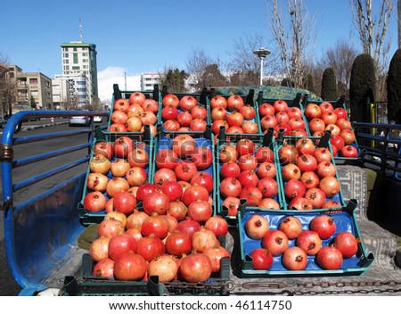 Pomegranates in back of street vendor pickup truck