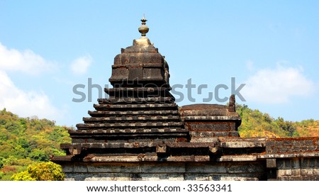 An old Indian temple with stone tomb on a hill top