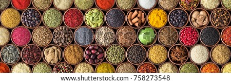 spice background, top view. seasoning in cups.