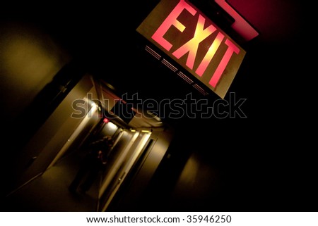 Exit panel in a dark floor