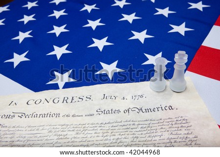 chessman and declaration of independence on the ensign of the USA