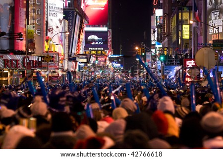 NEW YORK - DEC 31: Pedestrians gather in Times Square for New Year\'s Eve celebrations on December 31, 2008 in New York City.