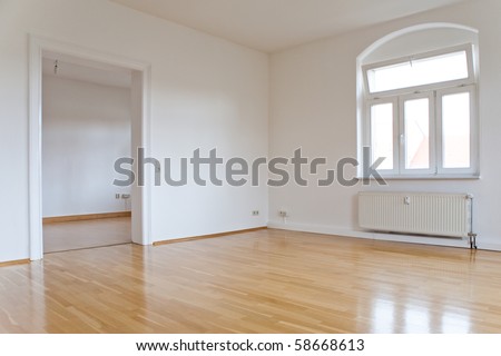 empty living room with window and door