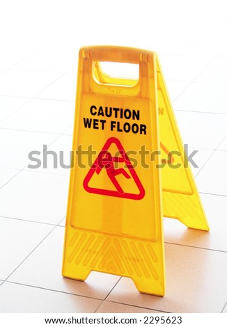 Wet Floor Caution Sign on the Floor