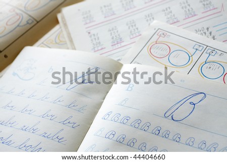 first alphabet writing in exercise book