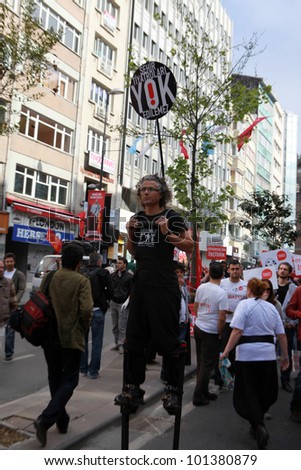 ISTANBUL, TURKEY - MAY 1: International Workers Day. Workers, socialist group and theater owners walks on Sisli and Taxim on May 1, 2012 in Istanbul, Turkey