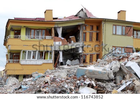 ERCIS, TURKEY-OCTOBER 25: Earthquake damage in Ercis, Van, Turkey. Destroyed houses after earthquake. October 25, 2011.