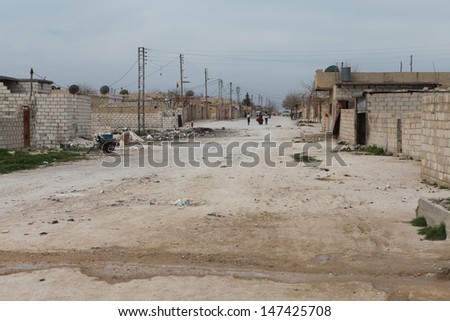 SEREKANIYE, SYRIA-MARCH 22: View of war damage from Serekaniye. Syrian war plane bombed Serekaniye. The Photo Taken, March 22, 2013.