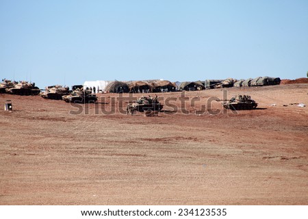SURUC, TURKEY-NOVEMBER 7, 2014: The Turkish army tanks stay at the border of Suruc. The photo taken november 7, 2014.