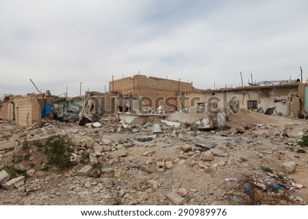 SEREKANIYE, SYRIA-MARCH 22: View of war damage from Serekaniye (Ras Al Ayn). Syrian war plane bombed Serekaniye. The Photo Taken, March 22, 2013.