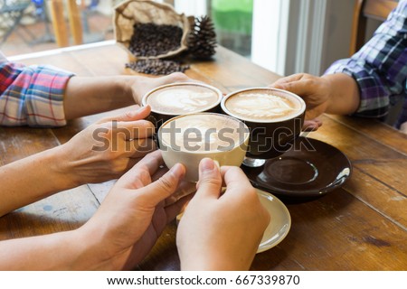 Latte coffee art and people meeting friendship togetherness coffee shop concept