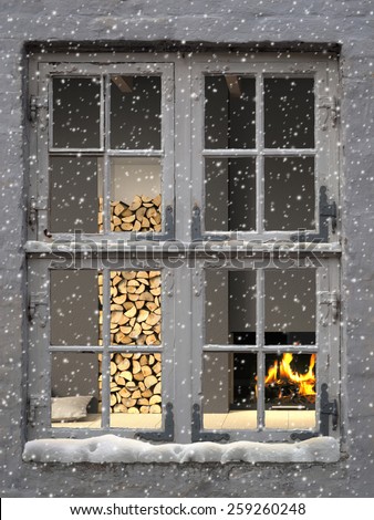 3D rendering of cozy warm interior seen  through an old window while snow falls