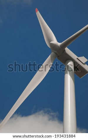 A wind power, propeller and sky
