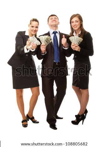 Businesspeople with pile of dollar banknotes