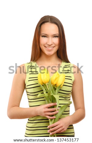 happy woman with yellow tulips over white