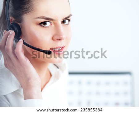 portrait of a customer service agent sitting at office