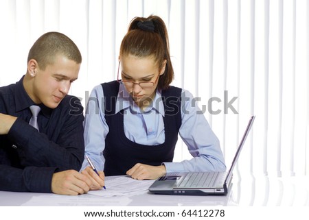 Business man and business woman working together