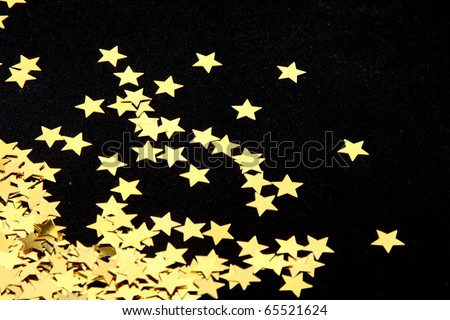 black and gold stars background. stock photo : Gold stars on