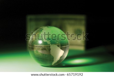 glass globe and money