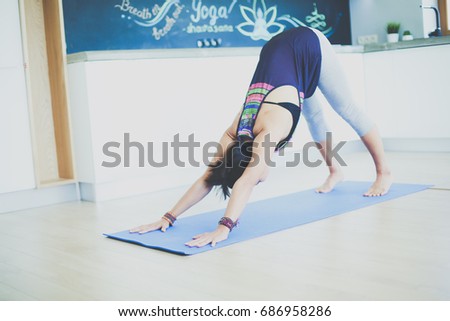 Asian woman are yoga exercises at home. Woman. Yoga.