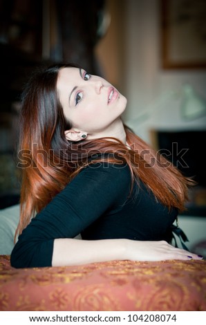 Portrait of a sensual young woman. Shallow depth of field.
