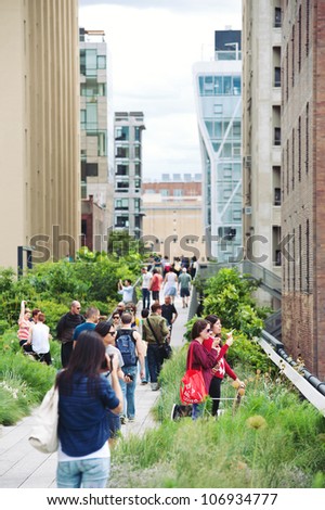 NEW YORK CITY - JUN 24: High Line Park in NYC on June 24th, 2012. The High Line is a public park built on an historic freight rail line elevated above the streets on Manhattans West Side.