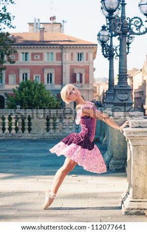 Young beautiful ballerina dancing in Bologna, Italy. Ballerina project.
