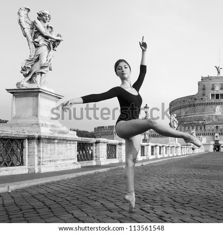 Young beautiful ballerina dancing out in the street in Castel Santangelo bridge in Rome, Italy. Black and white image. Ballerina Project.