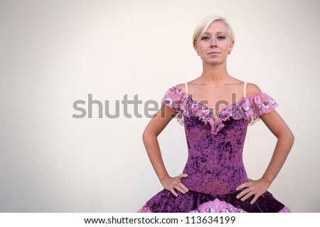 Portrait of beautiful ballerina against white background. Ballerina project.