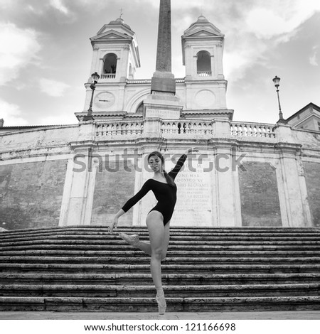 Young beautiful ballerina dancing on the Spanish Steps in Rome, Italy. Ballerina Project. Black and white image.