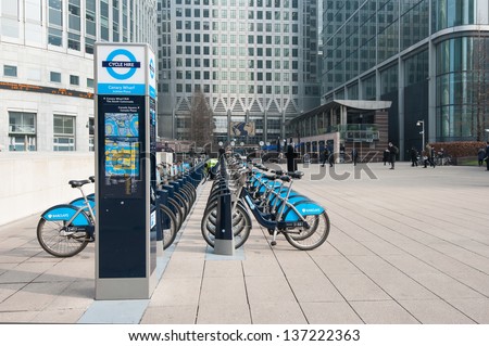 London - April 10: Barclays Cycle Hire In Canary Wharf On April 10, 2013. Barclays Cycle Hire (Bch) Is A Public Bicycle Sharing Scheme In London, Currently With 8,000 Cycles And 570 Docking Station.