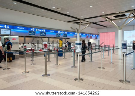 BOLOGNA, ITALY - MAY 31: Check in desk at Bologna airport. The airport is named after Bologna native G. Marconi, an Italian electrical engineer and Nobel laureate. May 31, 2013 in Bologna, Italy.