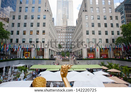 NEW YORK - JULY 2: Rockefeller Center plaza on 5th Avenue on July 2, 2012 in New York. It was built by the Rockefeller family in 1939 and was declared a National Historic Landmark in 1987.