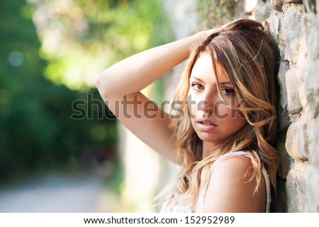 Sensual young woman portrait, shallow depth of field.