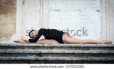 Young beautiful ballerina dancing on the Spanish Steps in Rome, Italy. Ballerina Project.