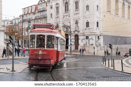 LISBON, PORTUGAL - JANUARY 2, 2014: Traditional tram in Largo de Chiado. The Lisbon tramway network is in operation since 1873, it presently comprises five urban lines.