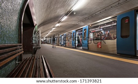 LISBON, PORTUGAL - JANUARY 2, 2014: People arriving in Intendente metro Station. The Lisbon Metro opened in 1959, it was the first subway system in Portugal. It consists of 4 lines and 55 stations.